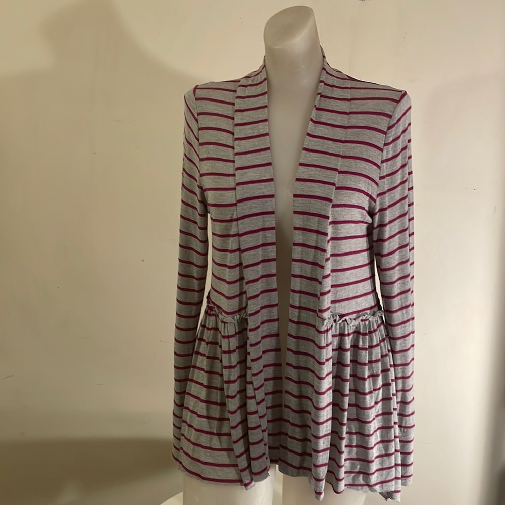 Striped woman’s cardigan with lace back
